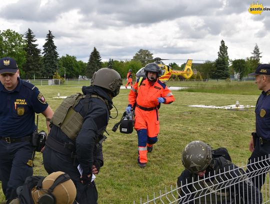 Strzały, strach, helikoptery i walka o życie. ZDJĘCIA